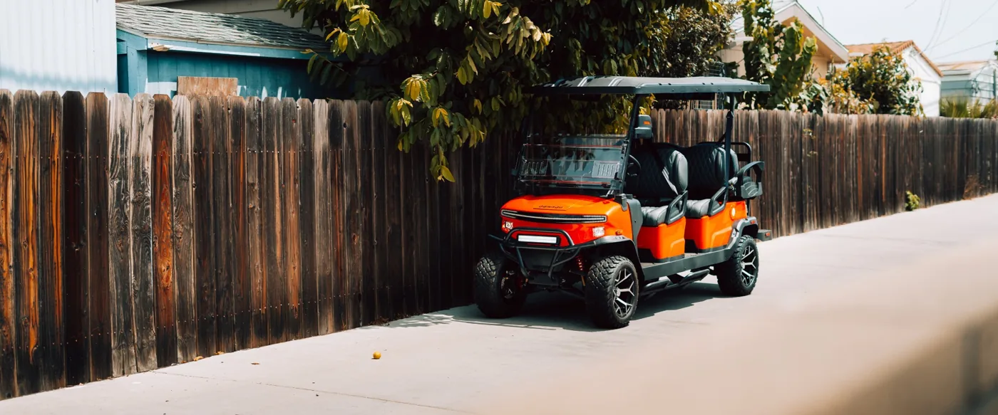 Lifted golf cart on a Southern California street